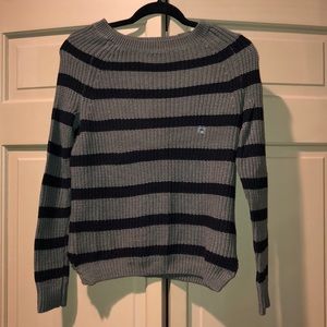 Olive green and black striped sweater.